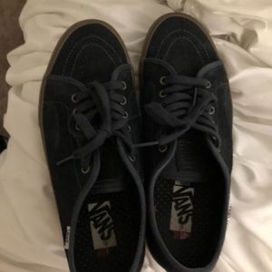 Brown and navy gumsole vans